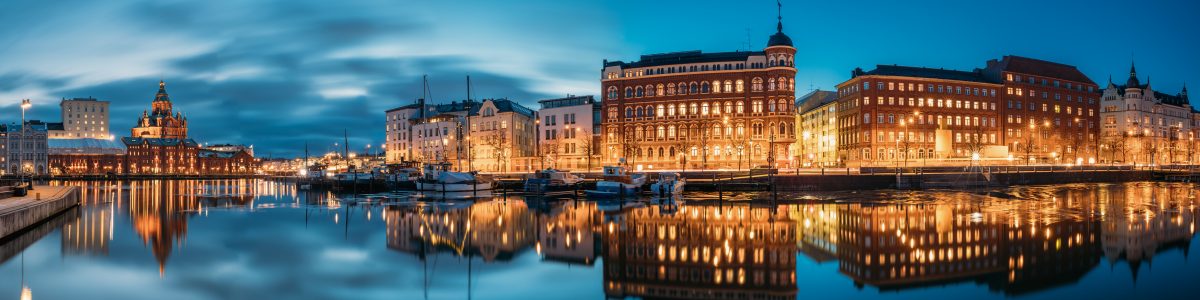 Helsinki, Finland. Panoramic View Of Kanavaranta Street With Uspenski Helsinki, Finland. Panoramic View Of Kanavaranta Street With Uspenski Cathedral And Pohjoisranta Street In Evening Night Illuminations.