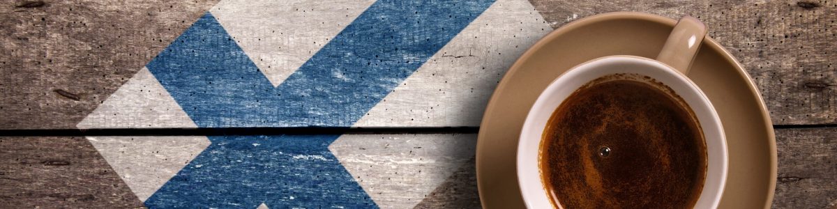 Finland flag with coffee Finland flag with coffee on table. top view